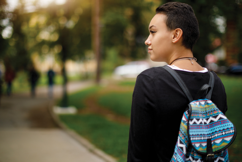 Stock photo of young woman in profile