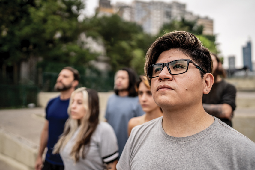 stock photo of a person standing in a crowd