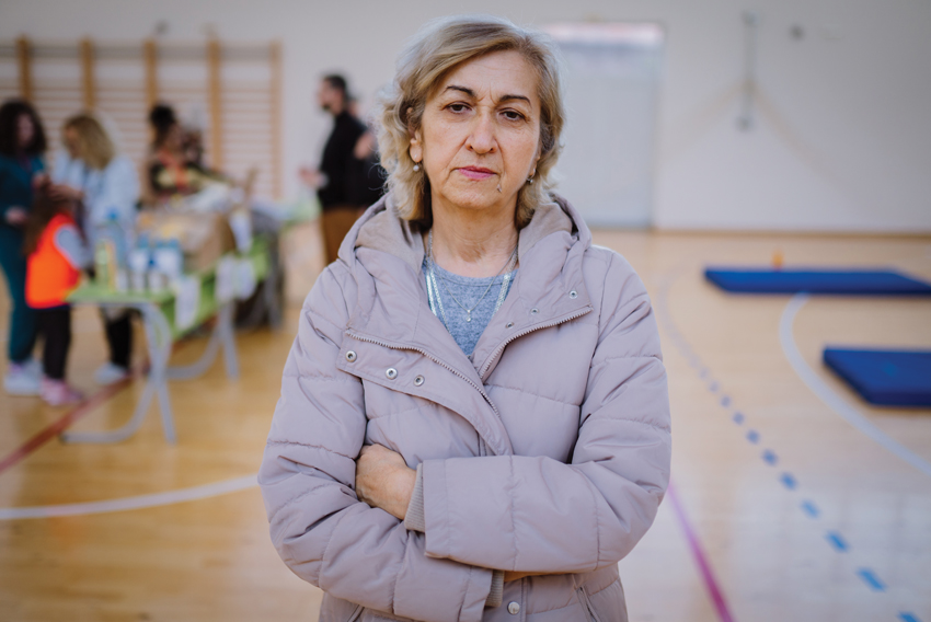 Stock photo of mature woman in community centre