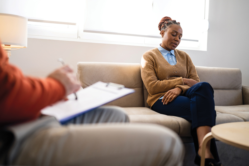 Stock photo of woman with therapist