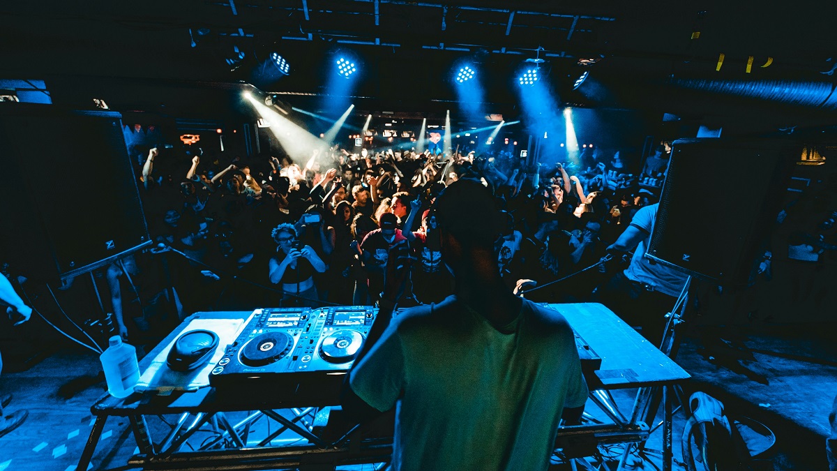 stock photo of a DJ and crowd at a club