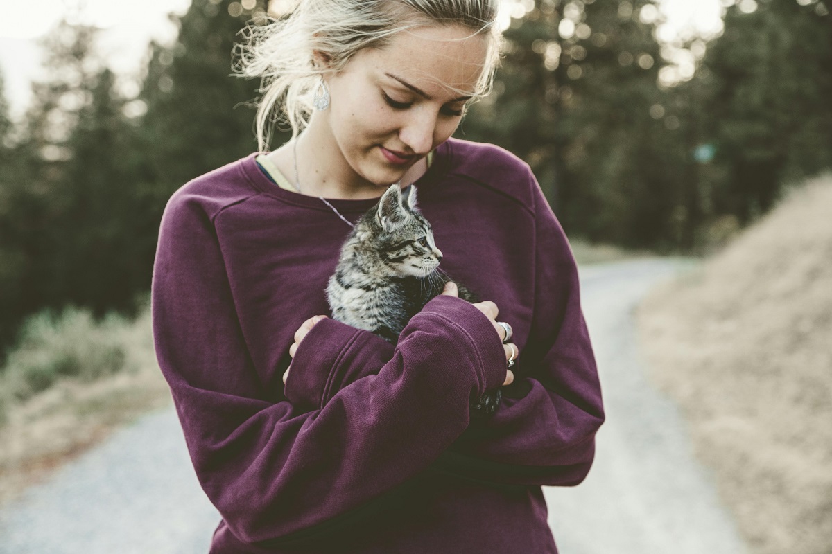 photo of a woman with a kitten