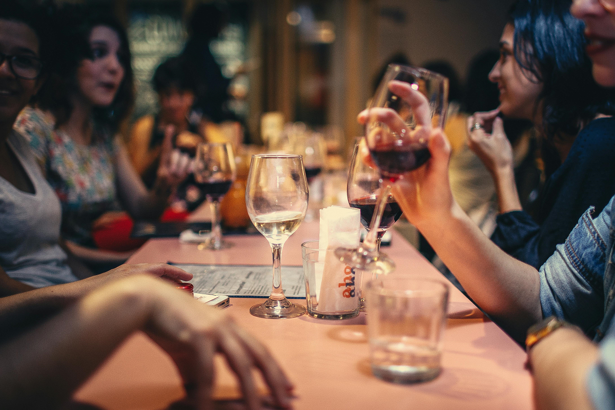 stock photo of people drinking wine in a bar