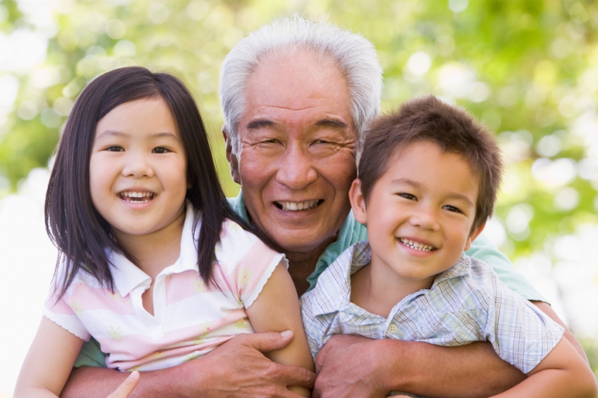 stock photo of a man with two children